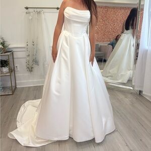 Strapless satin wedding gown